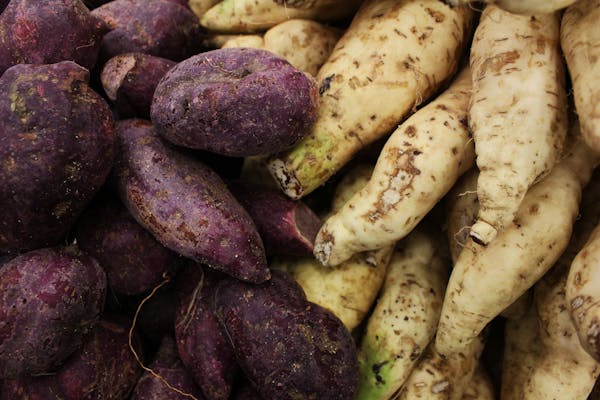 Image showing variety of sweet potatoes option. The Japanese and brown potatoes.