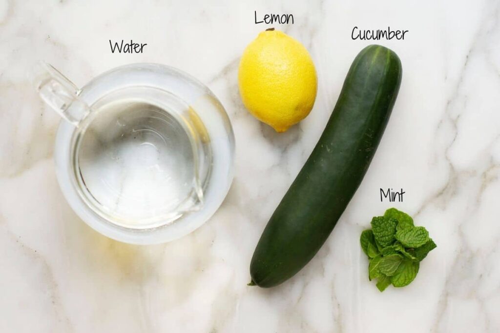 Water, Mint, Lemon and Cucumber on a platform.