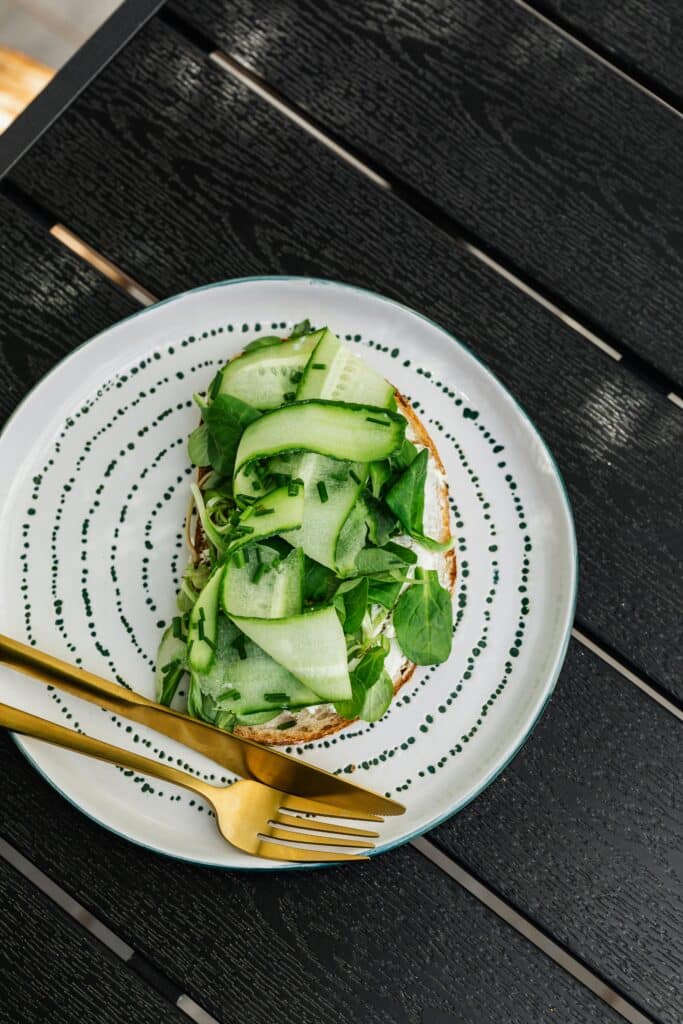 Cucumber, Lemon and Mint salad in a white plate